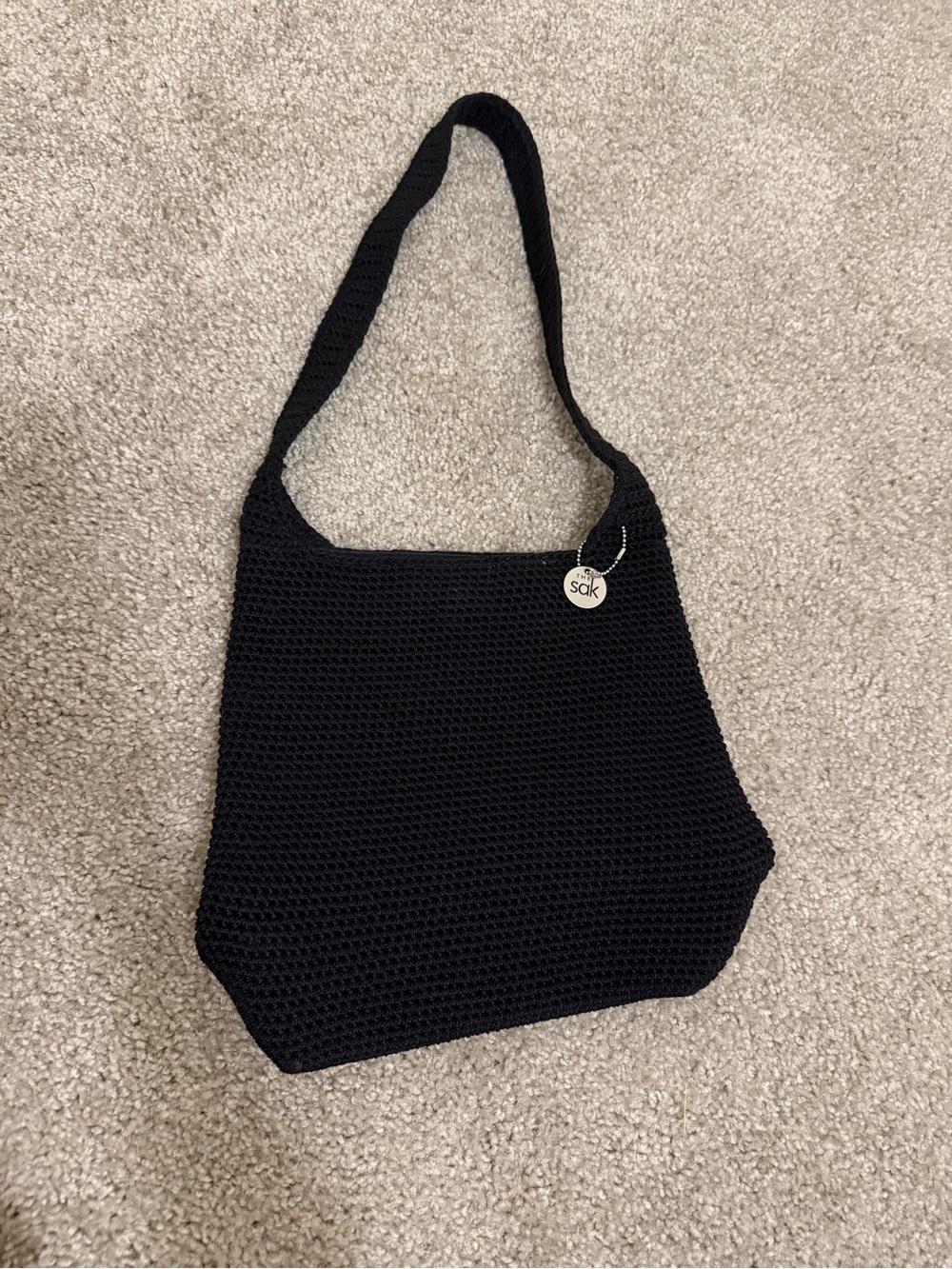The Sak Black Knit Shoulder Bag with Signature Charm